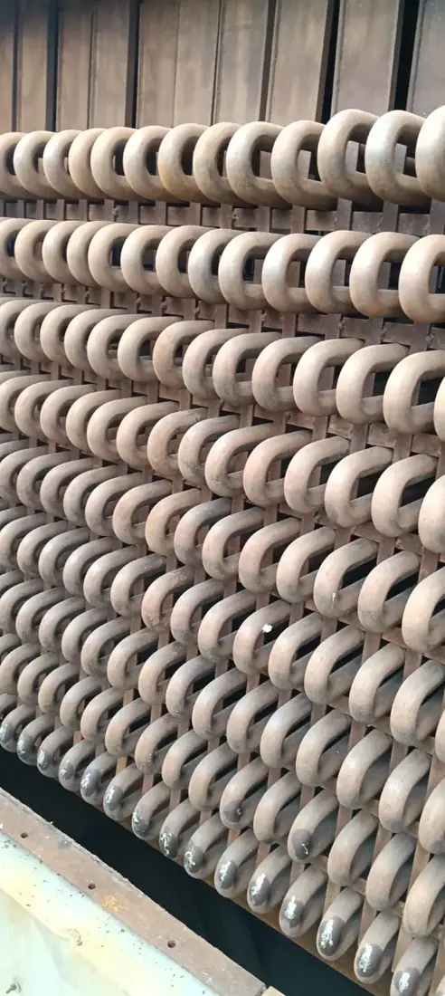 Boiler bank tube bends stacked in racks