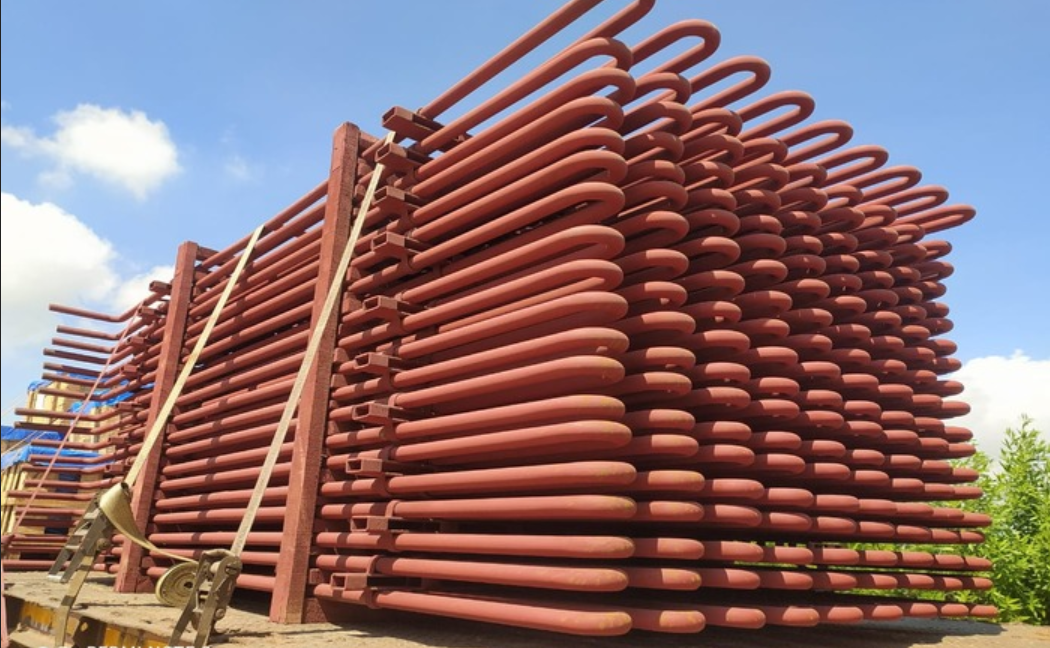 Economizer coils photographed in the Siddhi Enterprises company profile